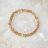 Fersken Månesten krystal armbånd – feminin ro og styrkende energi